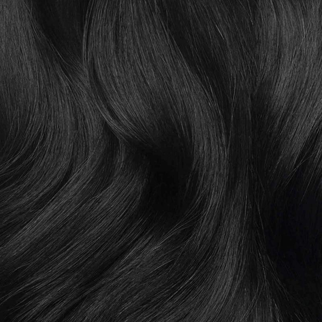 Smooth, shiny strands of jet black hair displaying the richness of Extra Hair Extension Piece - Jet Black #1