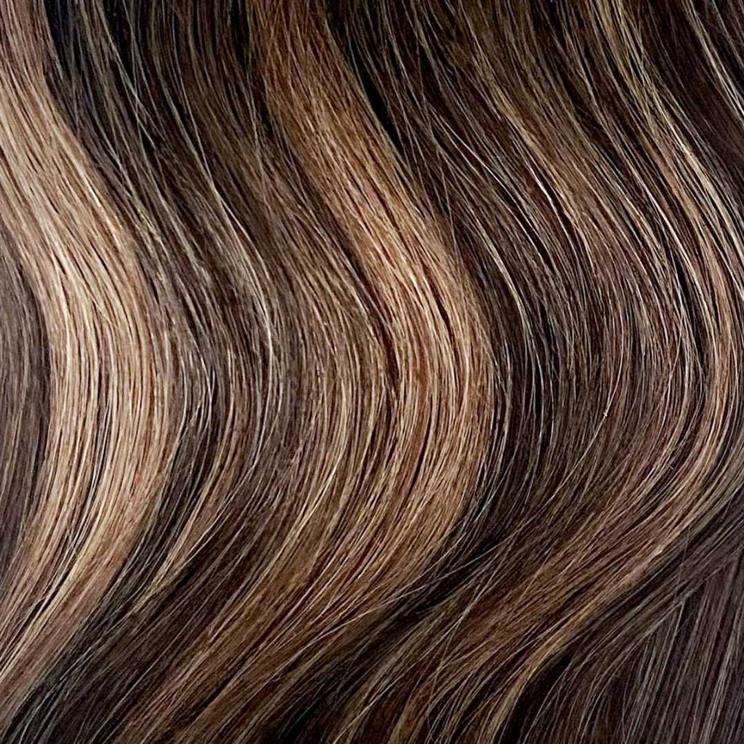 Extra Hair Extension Piece - #DU showing natural-looking brunette strands with warm subtle highlights and soft waves.